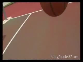 Charming chica Juggs out on basketball court