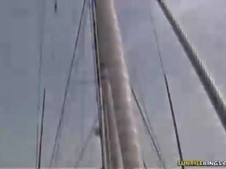 Blonde gives a blowjob on the boat