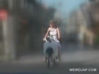 Asian Teeny Riding The Bike With No Panties Gets Very Wet